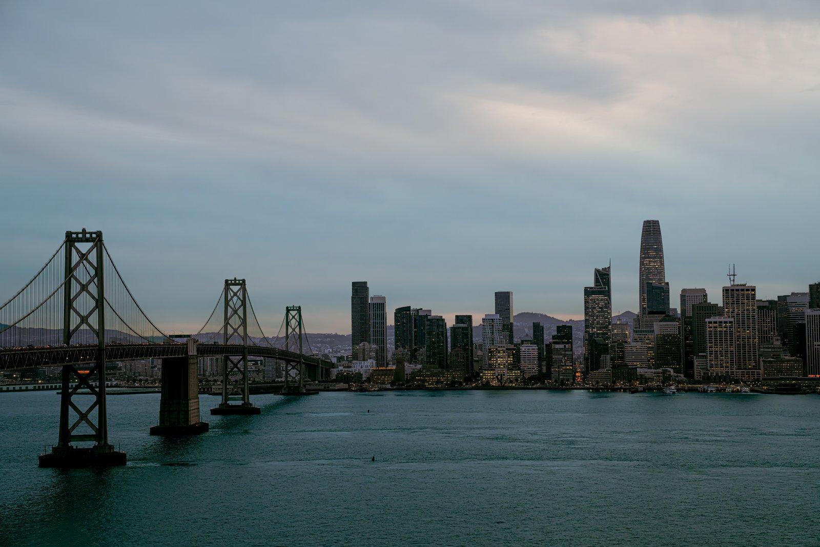 Bay Bridge and San Francisco skyline at dusk